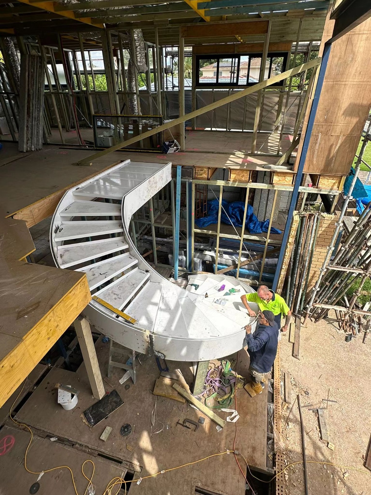 Curved staircase installation on site